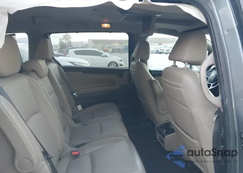 2021 Honda Odyssey Touring z USA, uszkodzony, nr VIN 5FNRL6H86MB011538